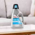 Oxy Professional carpet cleaner formula background couch