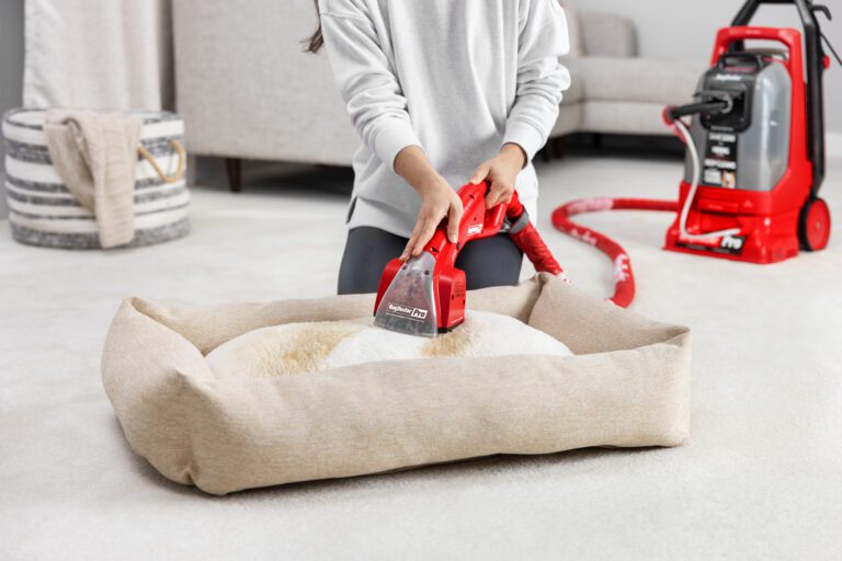 Pro Deep Pro Motorized Upholstery Tool: In use cleaning a pet bed